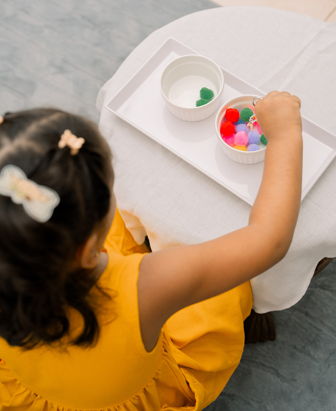 A child building with wooden shapes
