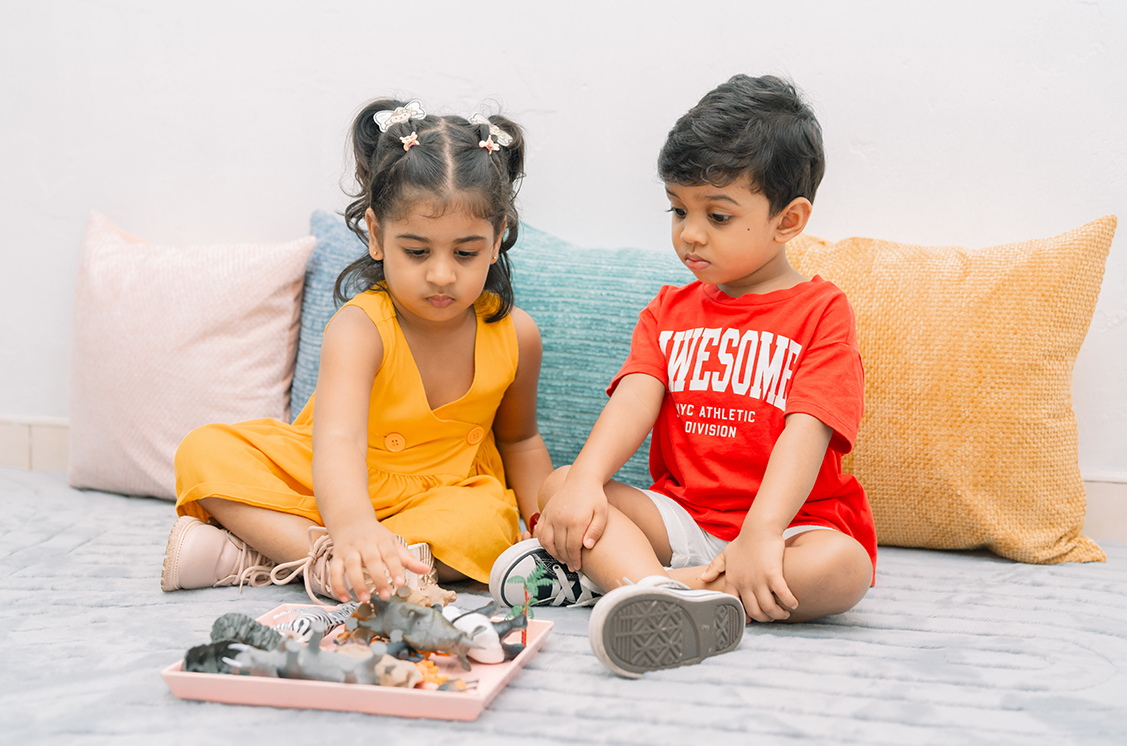 A child working with Montessori learning materials