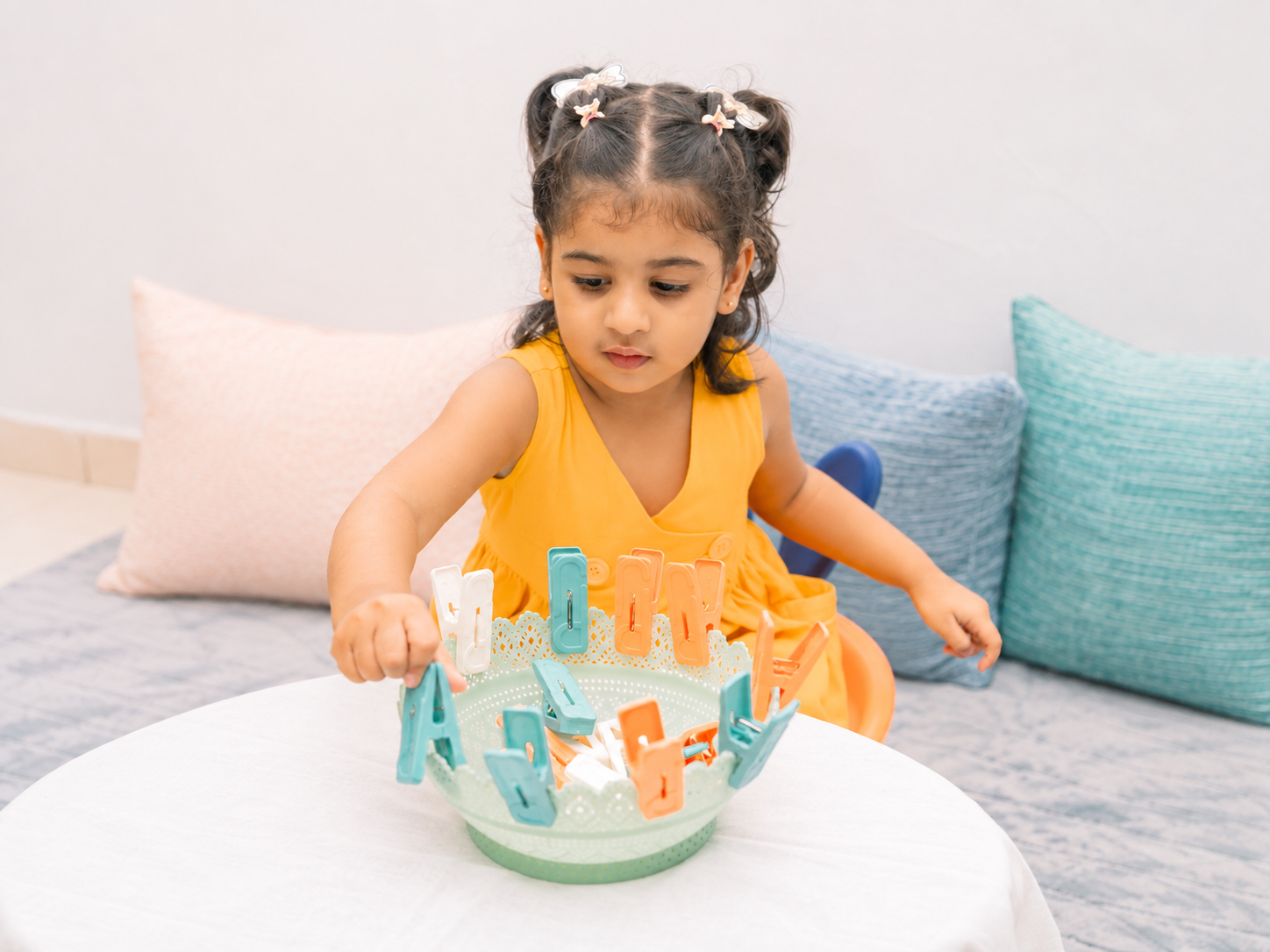 A child working with Montessori learning materials