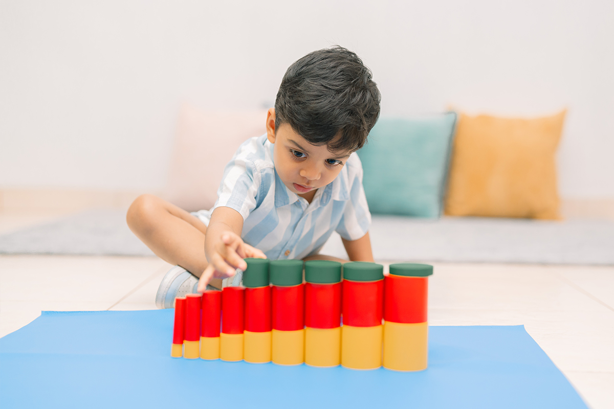 A child learning in the Montessori 2nd Year classroom