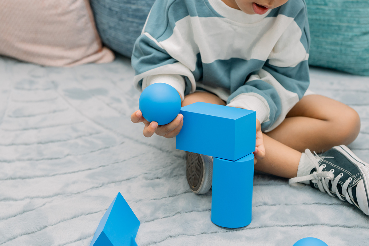 A child learning independently in a Montessori environment